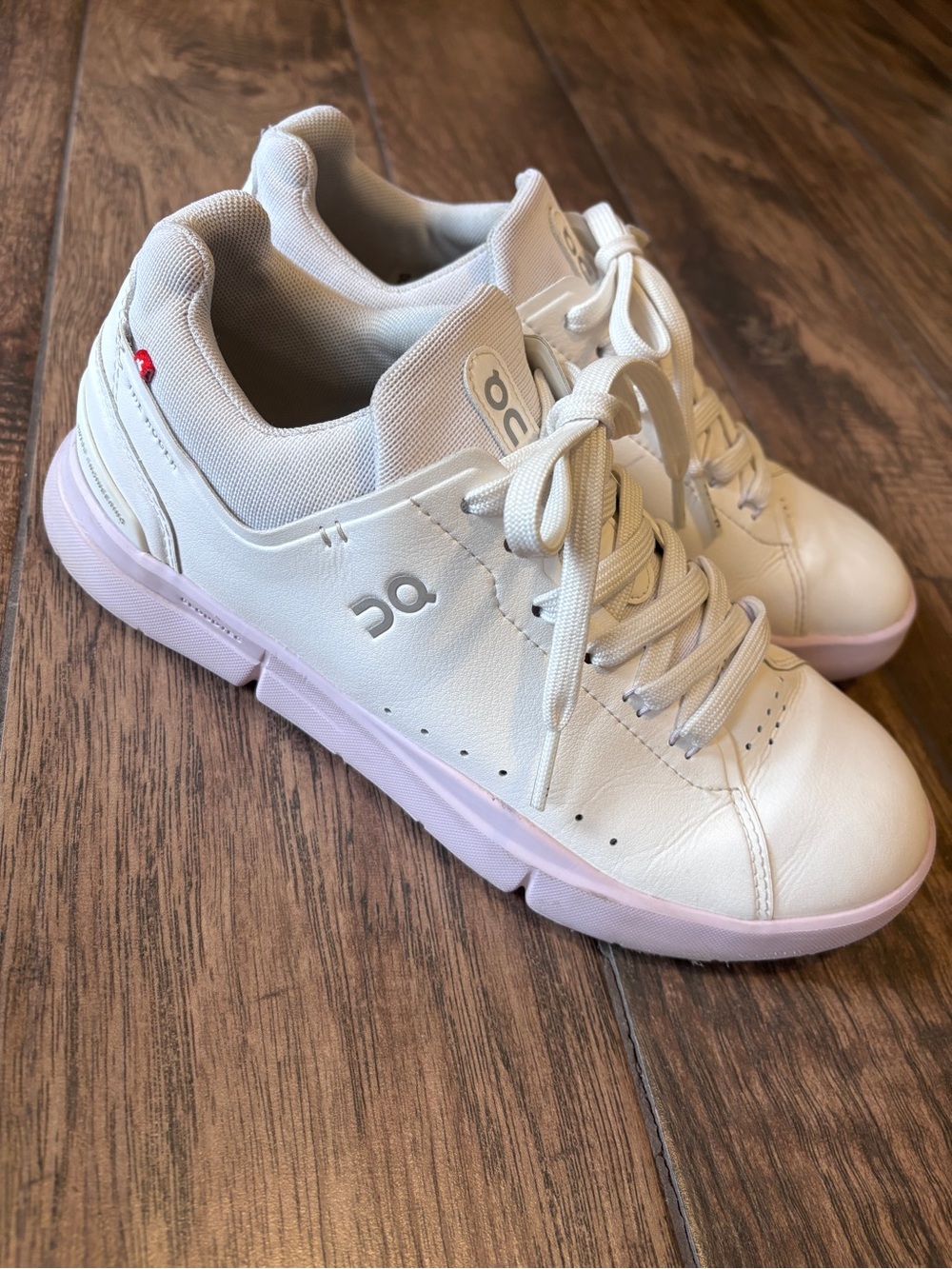 On Running Women's Roger White Leather Sneakers with Light Pink Sole